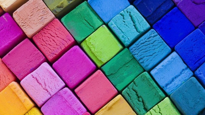 Colorful pastel chalks arranged diagonally