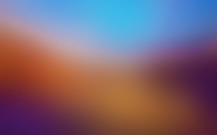 Blurred colorful gradient with purple, orange, and blue hues