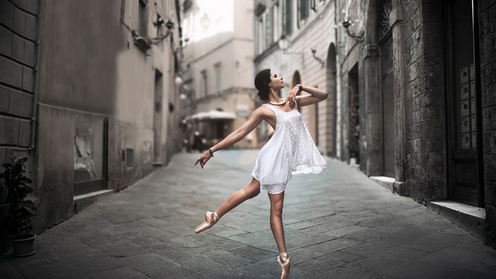 Ballerina dancing in a European street