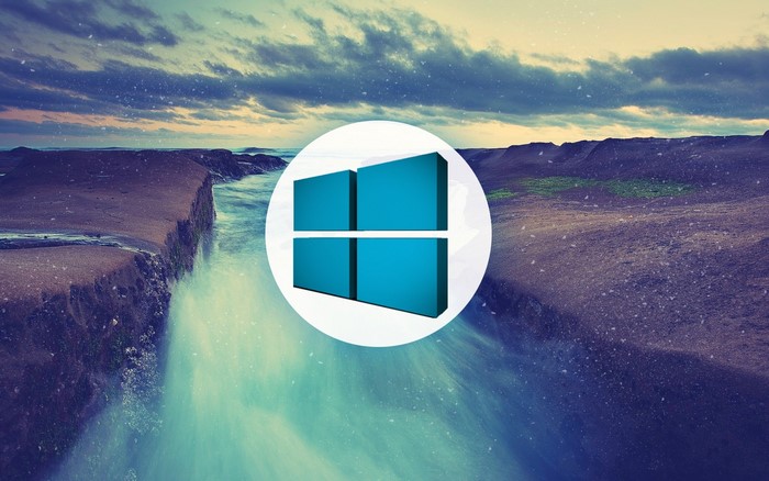 Windows 10 logo over a natural landscape