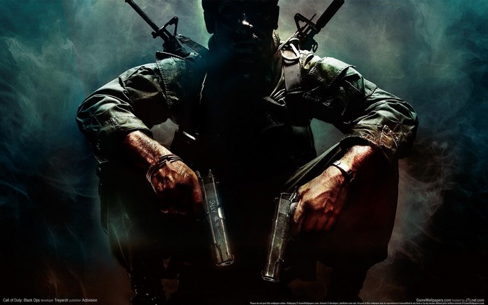Soldier from Call of Duty: Black Ops holding guns