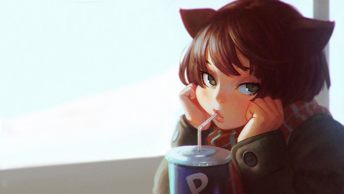 Girl with cat ears drinking from a cup