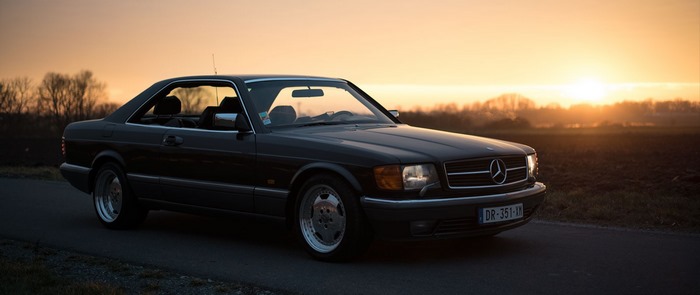 Mercedes-Benz SEC coupe at sunset