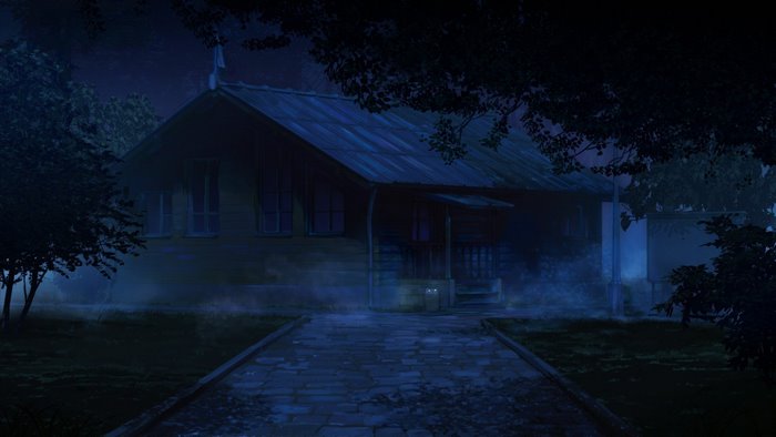 Cottage at night with a stone path