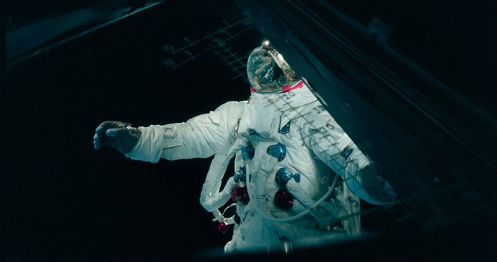 Apollo astronaut in a spacecraft