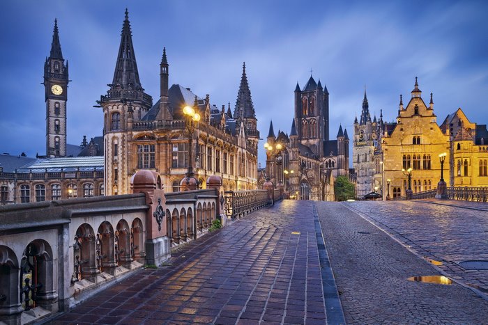 Ghent, Belgium cityscape at dusk with historic buildings