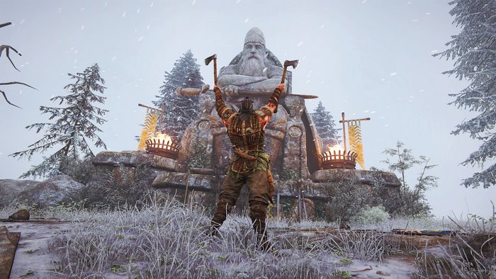 Viking warrior with axes in front of a stone statue in For Honor