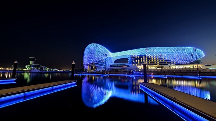 Yas Marina Circuit Abu Dhabi at night with blue lights