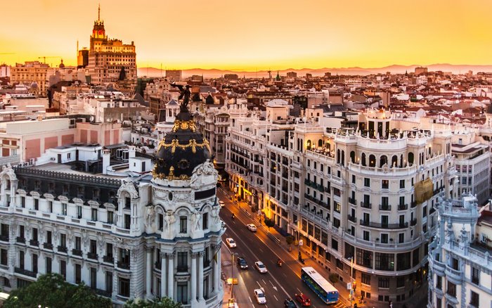 Madrid cityscape at sunset with historic buildings