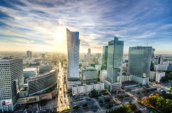 Warsaw skyline with modern skyscrapers at sunrise 4K