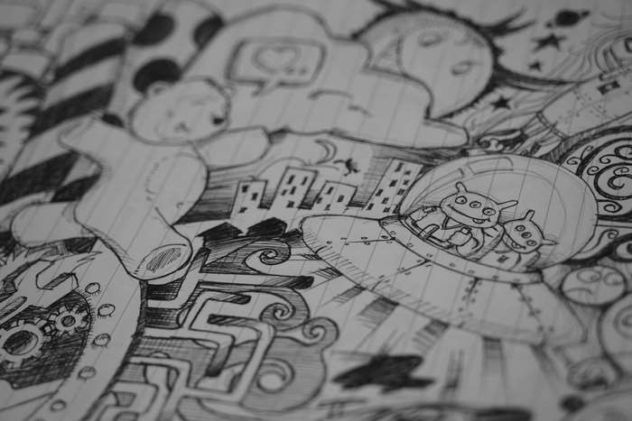 Doodle art with teddy bear and aliens in a UFO