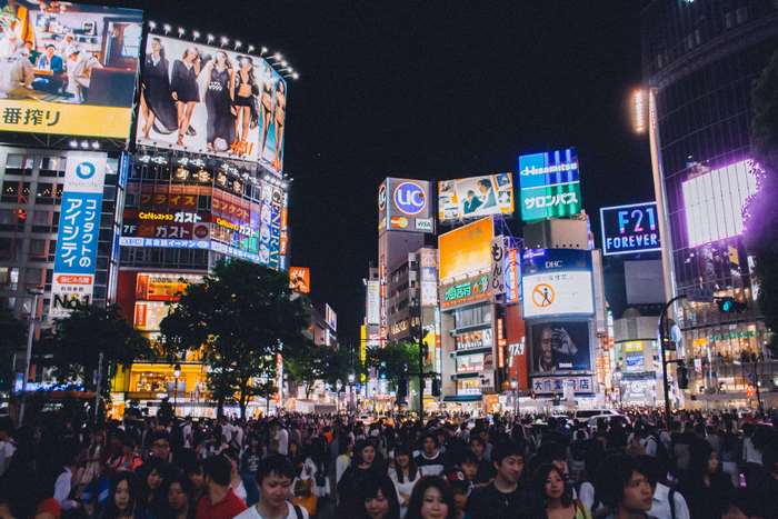 Shibuya Crossing at Night with Crowds and Billboards