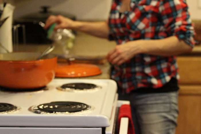 Person cooking in a kitchen 4K