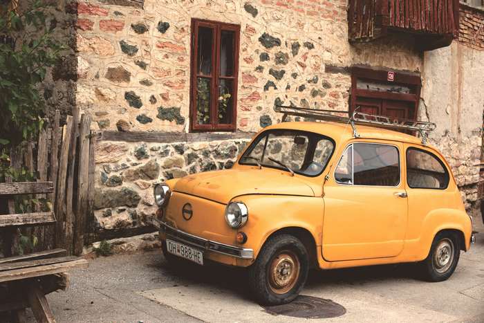 Yellow Fiat 600 classic car 4K
