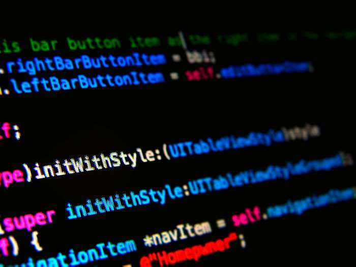 Objective-C code on a dark theme screen