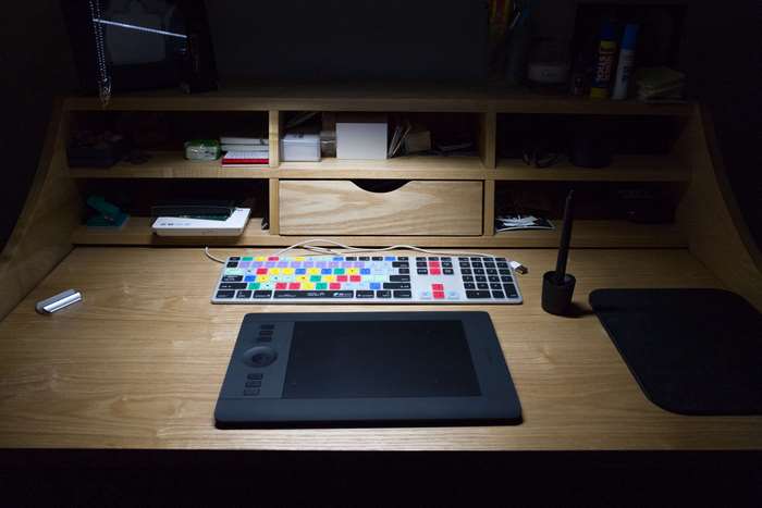 Desk with Wacom tablet and colorful keyboard
