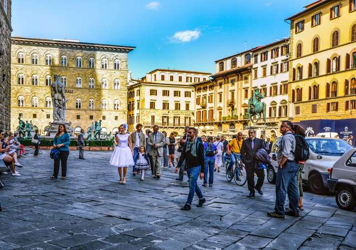 People in Piazza della Signoria, Florence, Italy
