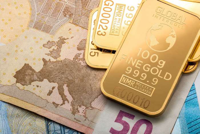 Gold bars on Euro banknotes