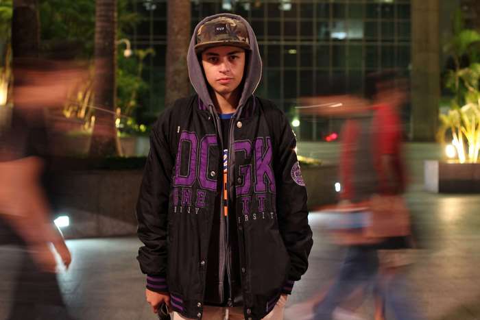 Boy wearing a jacket and a cap