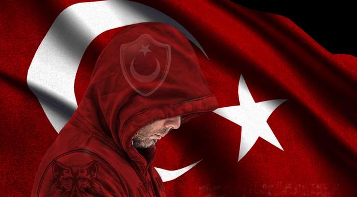 Man in hoodie against Turkish flag
