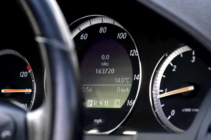 Car dashboard with speedometer and odometer