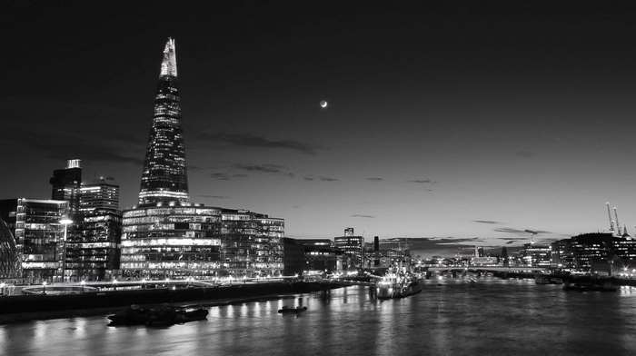 The Shard and London skyline at night over the Thames