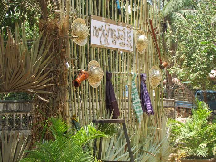 Khmer Culture Display with Traditional Instruments and Scarves
