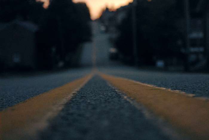 Empty street at sunset