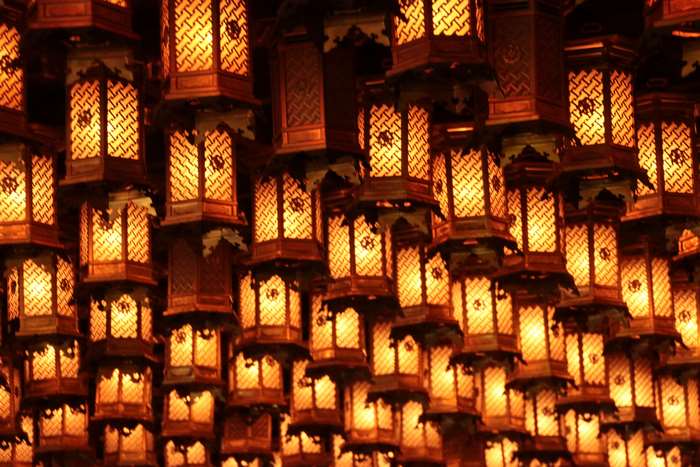Traditional Japanese lanterns illuminated at night