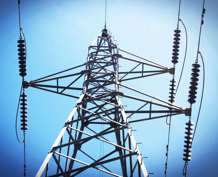 Electrical power tower with insulators and cables