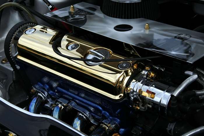 Close-up of a customized gold engine compartment