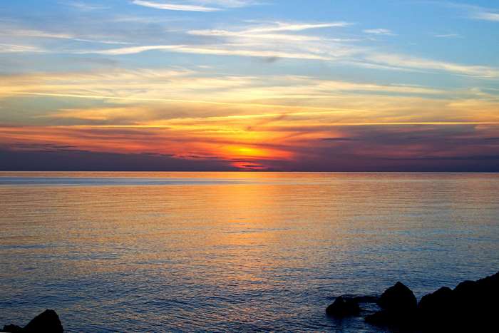 Sunset over the sea in San Nicola Arcella, Calabria, Italy