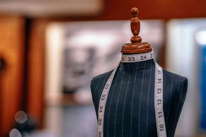 Tailor's dummy with measuring tape