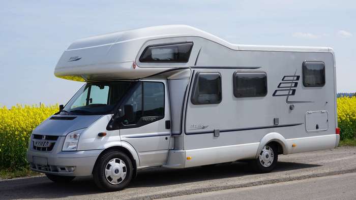 Hymer Ford Transit Camper Van in a Field