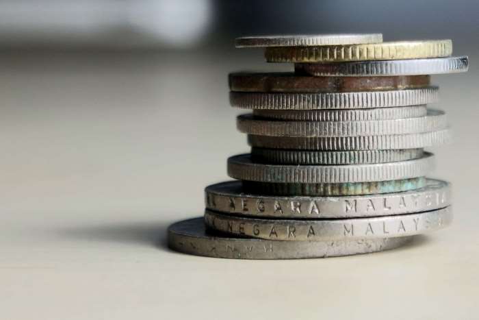 Stack of Malaysian coins on a table