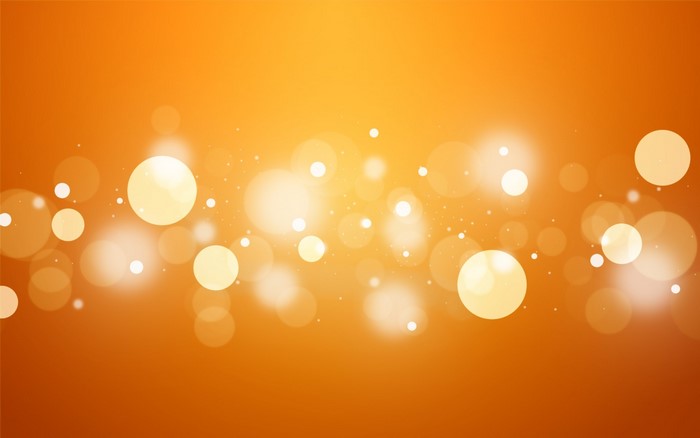 Orange background with bokeh lights and sparkles