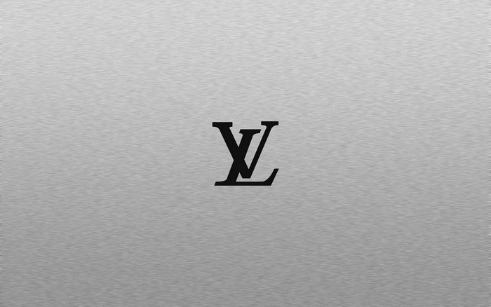 Louis Vuitton logo on brushed metal background