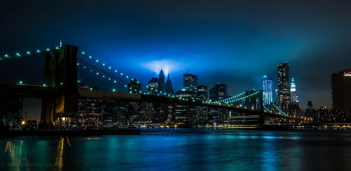 Brooklyn Bridge at Night over the River in New York City
