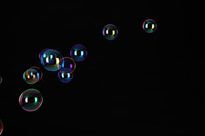 Bubbles floating on a black background