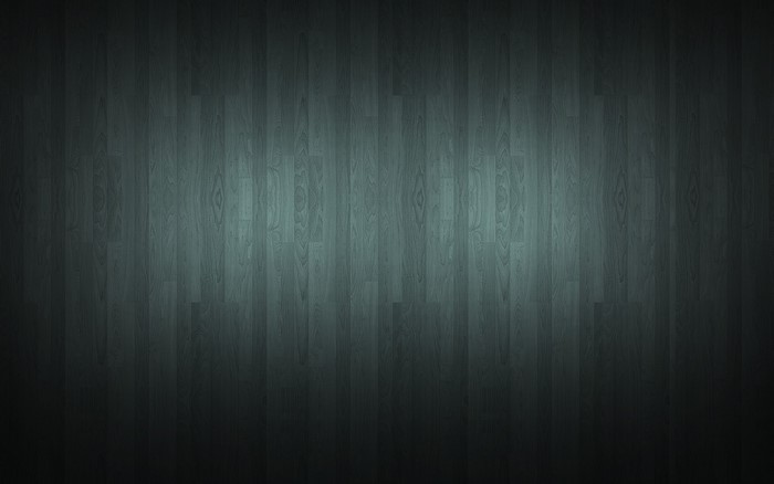 Dark wood parquet with subtle lighting