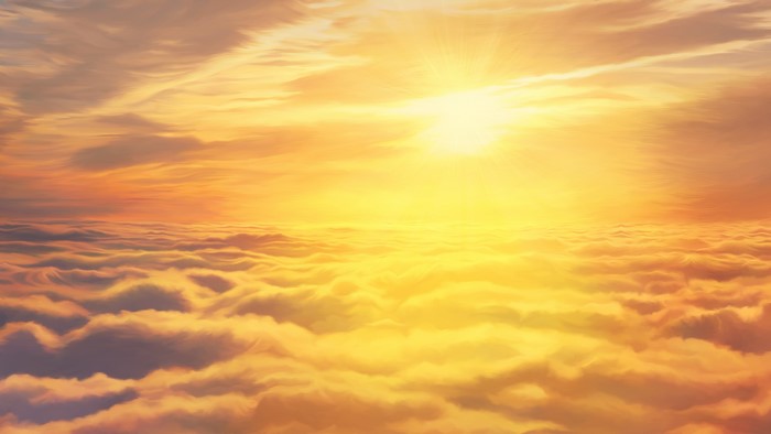Radiant Sun Above Golden Cloudscape at Sunrise