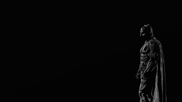 Batman standing in the dark