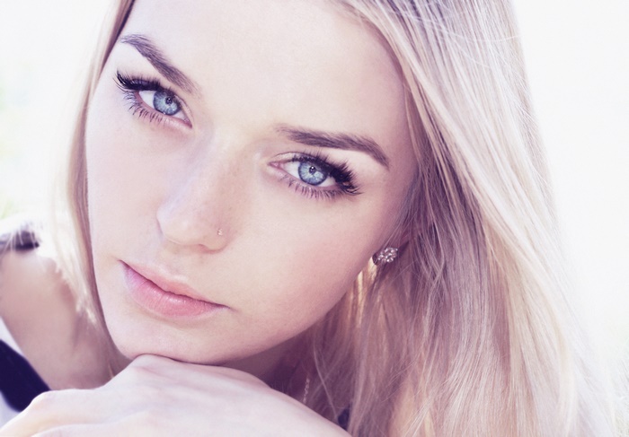 Woman with blonde hair and blue eyes