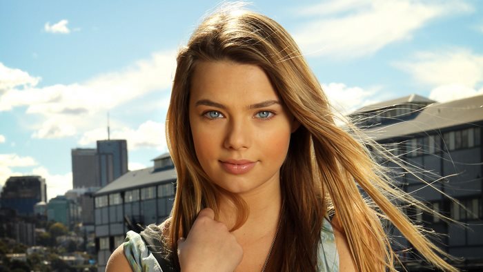 Indiana Evans with blonde hair and blue eyes