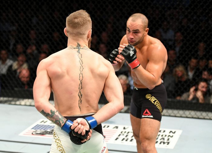 Conor McGregor and Eddie Alvarez in UFC octagon