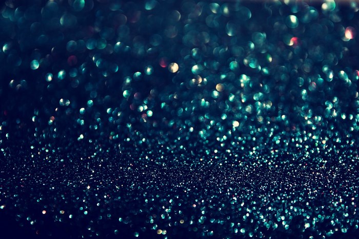 Dark blue glitter bokeh background