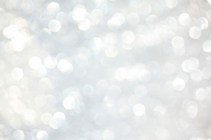 Abstract glitter background with bokeh effect