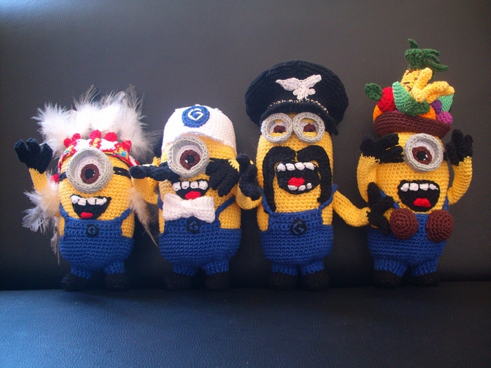 Four crocheted Minions with costumes