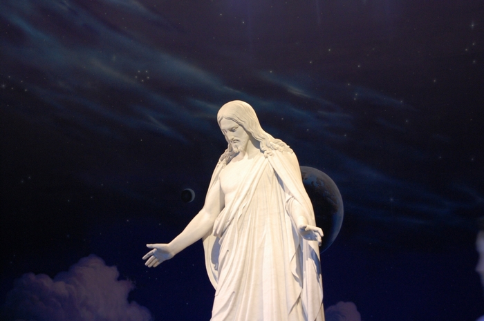 Statue of Jesus Christ against a starry sky