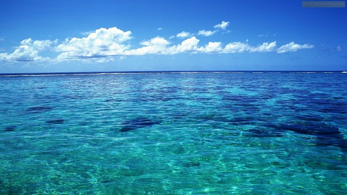 Ocean with Clouds and Blue Sky